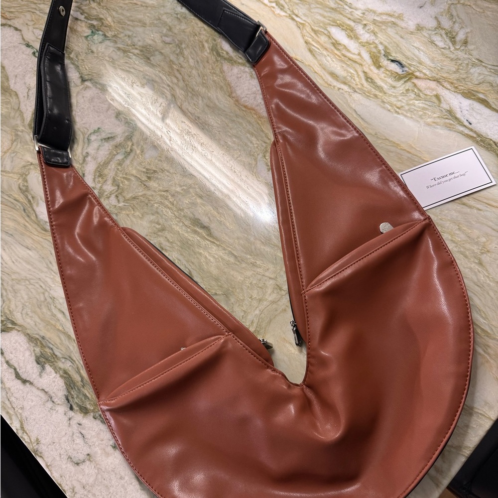 Brown and Black Crossbody Bag with Sleek Design